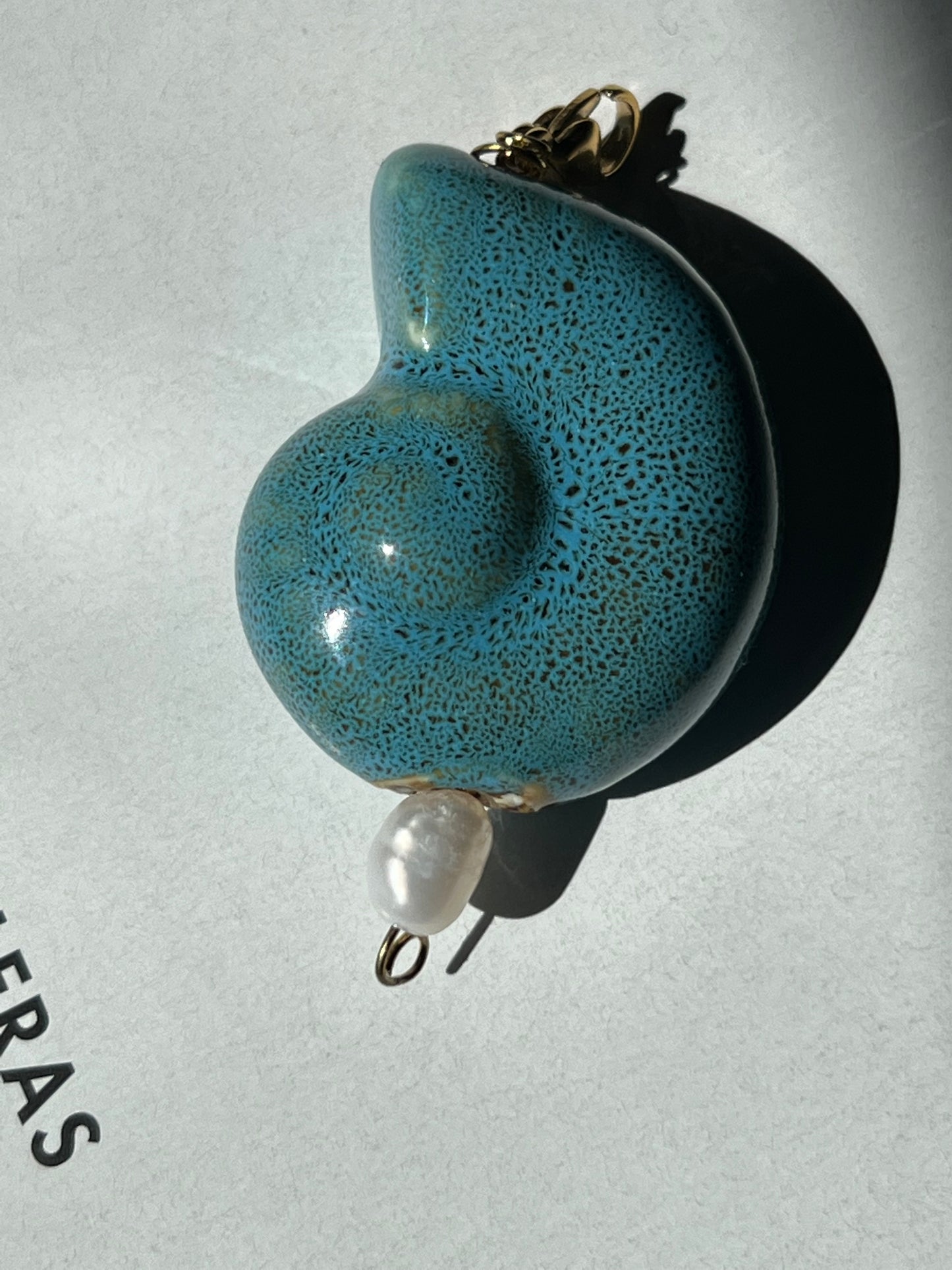 Charm caracola