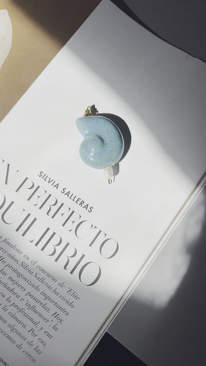 Charm caracola